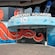 Una entrada a un museo con la caricatura de un pulpo pintado cerca de la puerta y un texto que dice “Malta National Aquarium” (Acuario Nacional de Malta)
